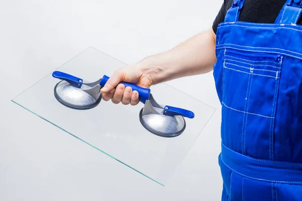 Glazier Holding Transparent Glass Suction Cup White Background — Zdjęcie stockowe