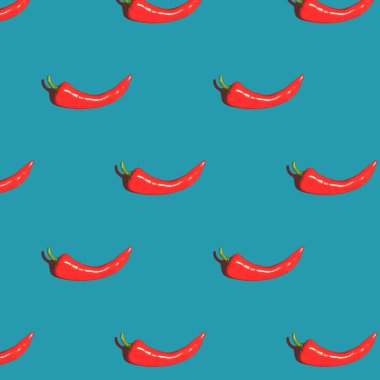 Mavi arka planda kırmızı biberden yapılmış kusursuz desen. Renkli yemek arkaplanı. En düşük bileşim.