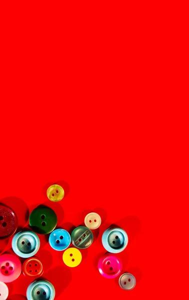 Colorful Buttons Scattered Red Background Vertical Banner — Stock Photo, Image