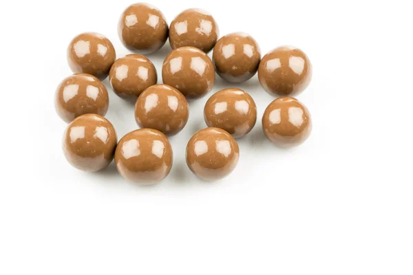 Bolas de chocolate em um fundo branco — Fotografia de Stock