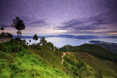 beautiful view and sunrise  on the lake Toba clipart