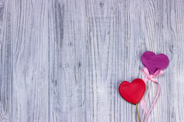 hearts on a wooden board