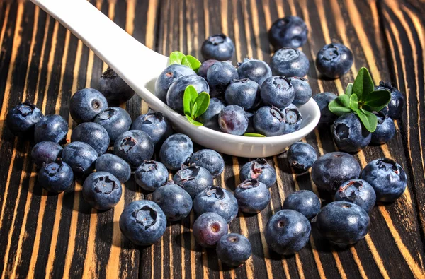 Blueberry on wooden table background. — Stock Photo, Image