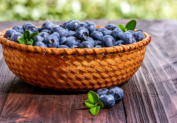 Blueberries  on a old  wooden table. — Stock Photo, Image