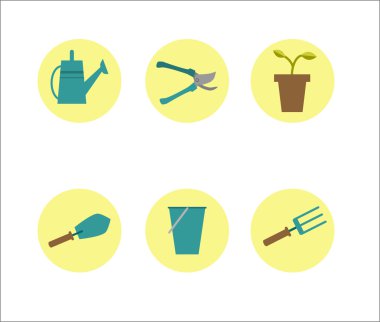 Sarı bir daire içinde Bahçe aletleri.