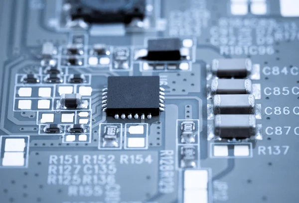 Circuit board with microchip closeup — Stock Photo, Image