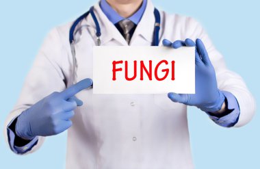 Doctor keeps a card with the name of the diagnosis - fungi clipart