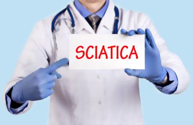 Doctor keeps a card with the name of the diagnosis - sciatica clipart