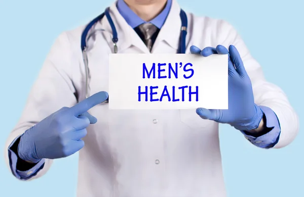 Lekarz trzyma karty z nazwą diagnozy - męskie zdrowie — Zdjęcie stockowe