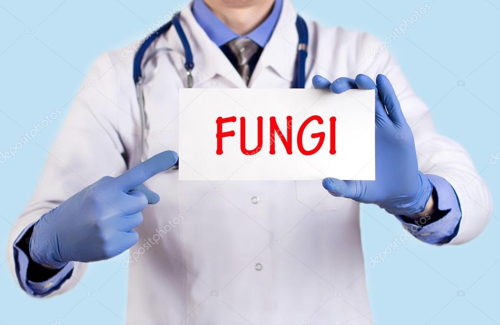 Doctor keeps a card with the name of the diagnosis - fungi