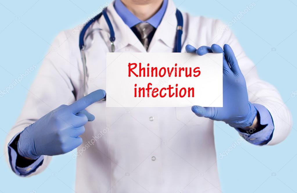 Doctor keeps a card with the name of the diagnosis - rhinovirus infection