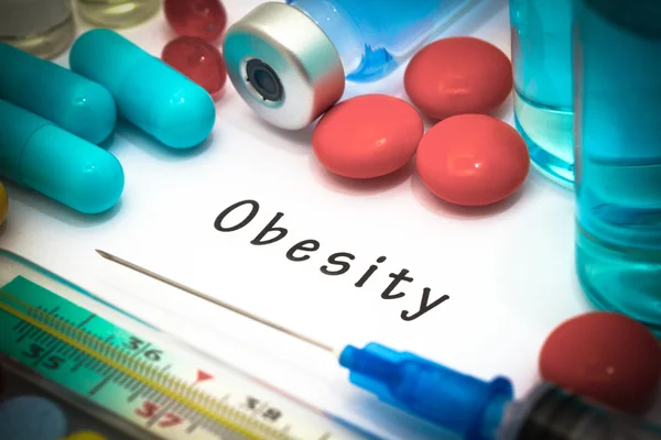 Obezita - diagnózy napsáno na bílý list papíru — Stock fotografie