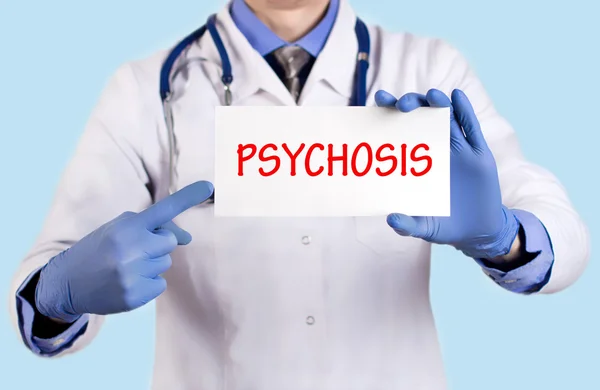 Lekarz trzyma karty z nazwą diagnozy - psychoza — Zdjęcie stockowe