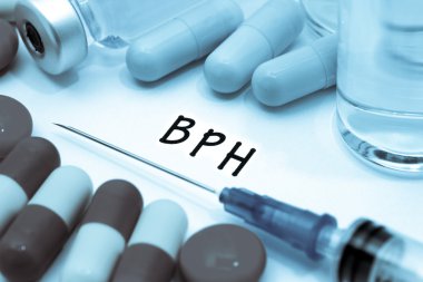 BPH - diagnosis written on a white piece of paper. Syringe and vaccine with drugs clipart