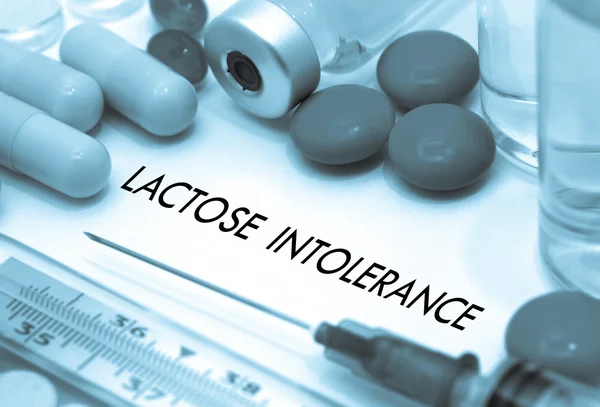 Lactose intolerance. Treatment and prevention of disease. Syringe and vaccine. Medical concept. Selective focus Stock Picture