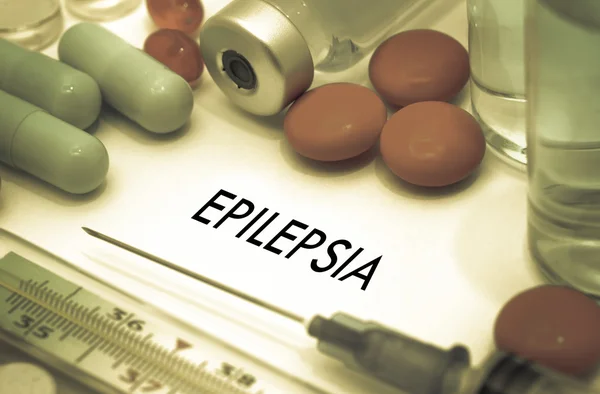 Epilepsia. Treatment and prevention of disease. Syringe and vaccine. Medical concept. Selective focus Royalty Free Stock Images