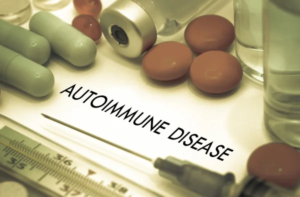 Autoimmune disease. Treatment and prevention of disease. Syringe and vaccine. Medical concept. Selective focus Stock Image