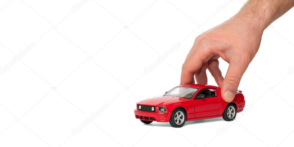 Red car in the men's hands