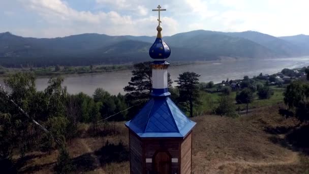 Aerial view of the road through autumn forest Republic Buryatia — Stock Video