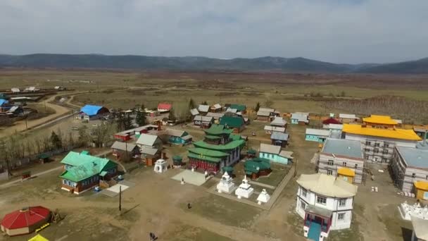 A birds-eye video shooting drone center of Russian Buddhism. — Stock Video