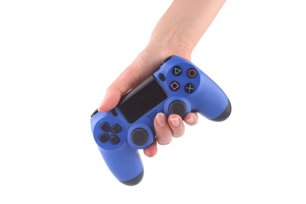 Consola azul en la mano sobre fondo blanco — Foto de Stock