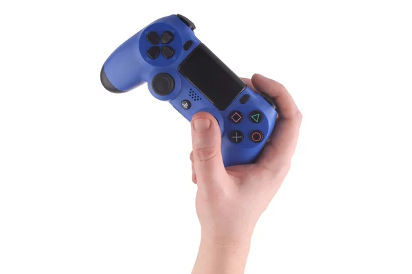 Niebieski w ręku kontroler gier — Zdjęcie stockowe