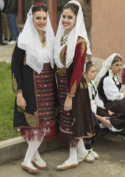 Pozarevac,Serbia-May 2,2016:girls in national  folk costumes smiling — Stock Photo, Image