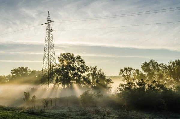 Novi Sad, Serbia - October 22, 2015: Exit from the suburbs near Novi Sad. The exit of the first morning rays of the sun at the exit from the suburbs.