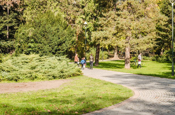 Novi Sad, Serbia - October 22, 2015: Visitors to the city park in the autumn, Novi Sad - Serbia.