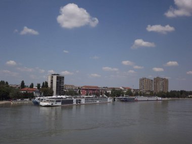 Anchored passenger ships on the promenade by the river Danube in Novi Sad.