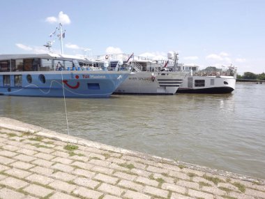 Anchored passenger ships on the promenade by the river Danube in Novi Sad.