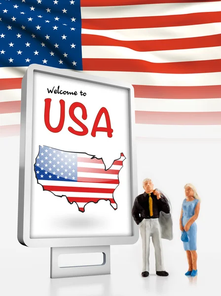 Miniature people in front a board with a map and flag from America — Stock Photo, Image