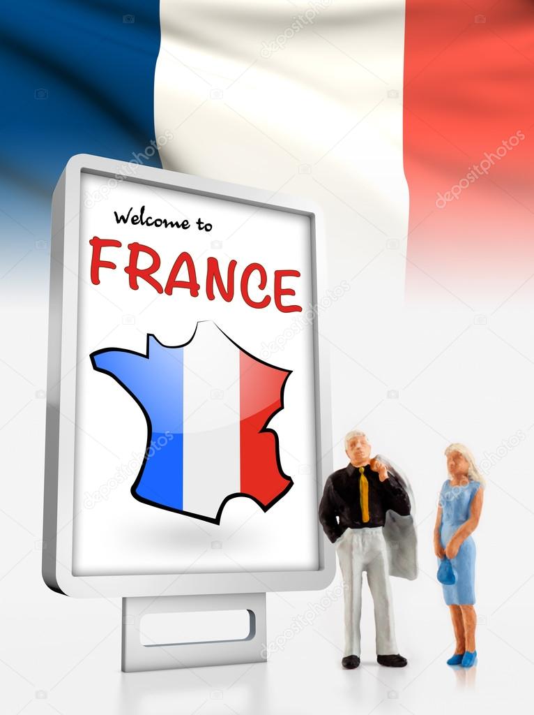 Miniature people in front a board with a map and flag from france