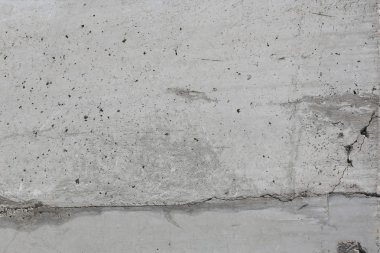 Cocrete wall with a seam background or texture. clipart
