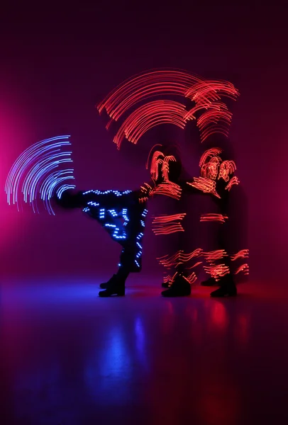 Light Painting Photography. Freezelight photo dancers — Stock Photo, Image