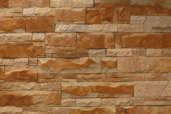 Кирпичная коричневая стена для фона или текстуры — стоковое фото