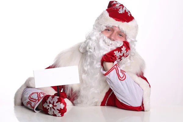 Portrait smiling Father Frost holding a sign — Stock Photo, Image
