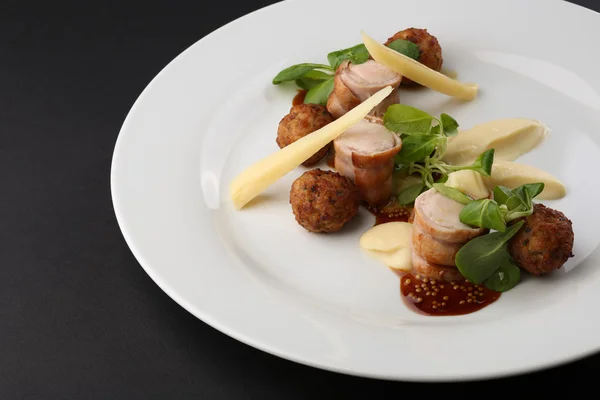 Baked meat rabbit roll and rissole with chees, souses on white plate. Close up — Stock Photo, Image