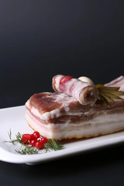 Salty spiced lard on a white plate, Ukrainian cuisine — Stock Image Salty spiced lard on a white plate, Ukrainian cuisine Stock Picture