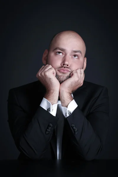 Portrait pensive stylish and brutal bald man with a beard — Stock Photo, Image