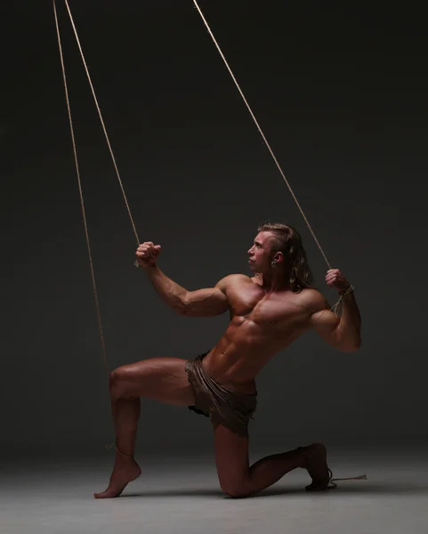 Young naked man, muscular body, bounded with rope — Stock Photo, Image