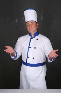 Portrait of an handsome chef wearing workwear