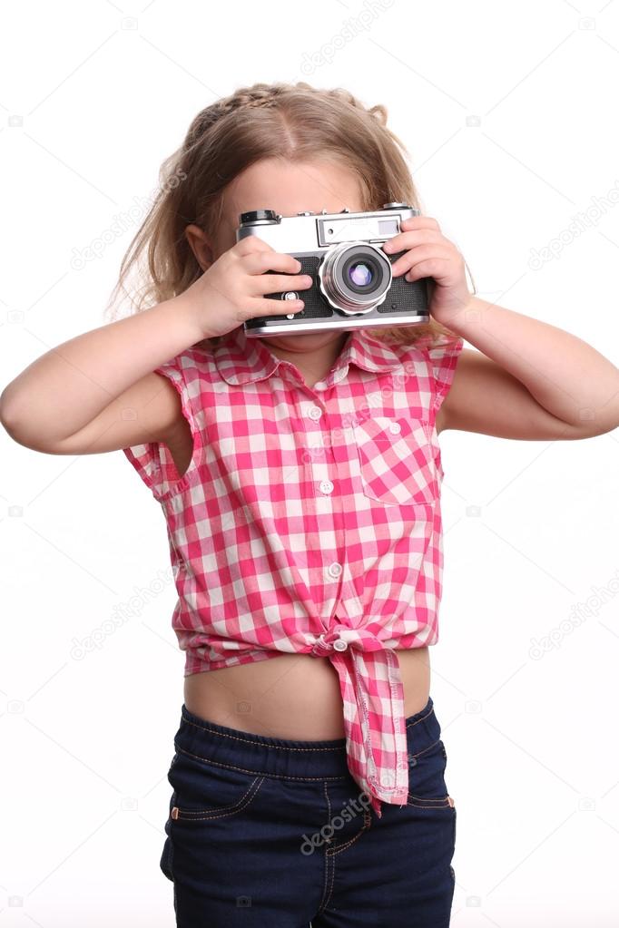 Girl taking photo. Close up. White background