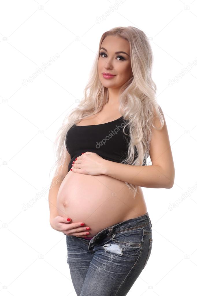 Pregnant woman with hands over belly. Close up. White background