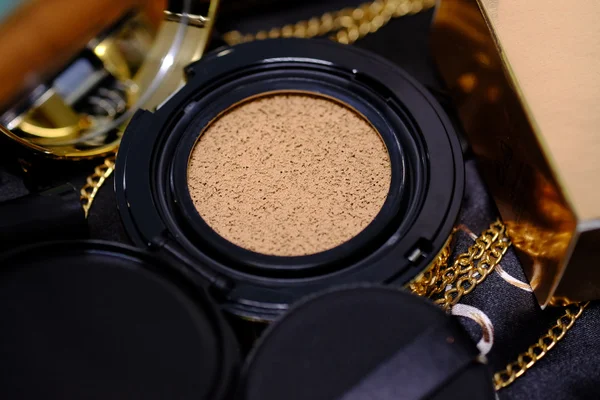 Cosmetics gold set for background.  (Selective focus) — Stock Photo, Image