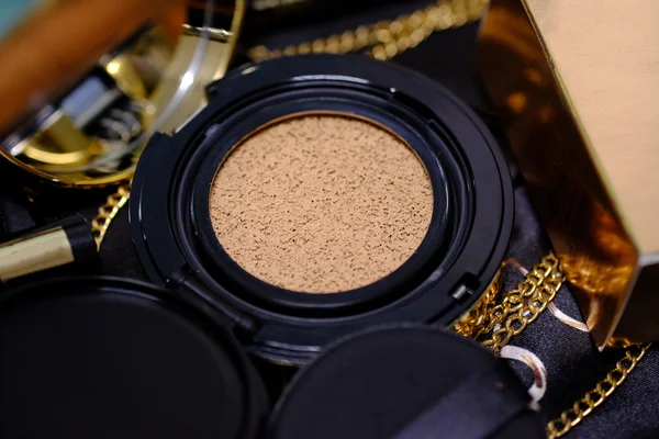 Cosmetics gold set for background.  (Selective focus) — Stock Photo, Image