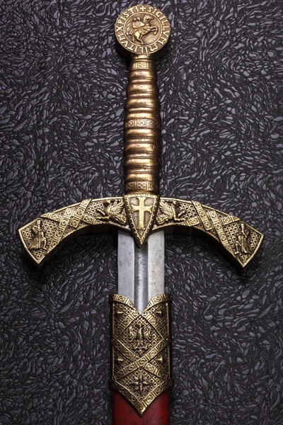 Antikes Schwert mit dem bronzenen Griff. Stockbild