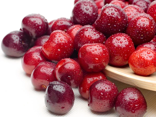 Macro un primer plano de cerezas frescas y cerezas dulces —  Fotos de Stock