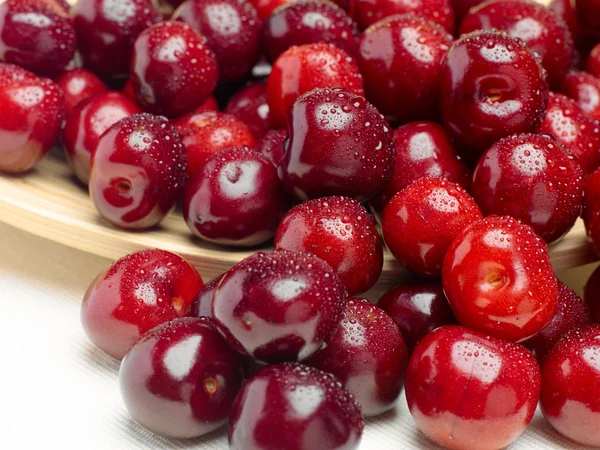 Macro un primer plano de cerezas frescas y cerezas dulces —  Fotos de Stock