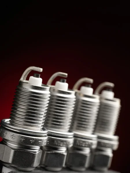 A set of new spark plugs of the car.